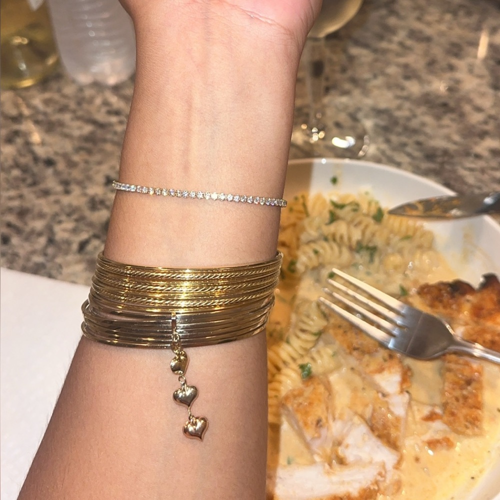 14k yellow gold 7 day bangle Semanario 
12 grams MSG